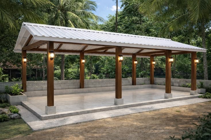 An open pavilion with a white metal roof on wooden posts with lanterns, over a raised stone-tiled floor